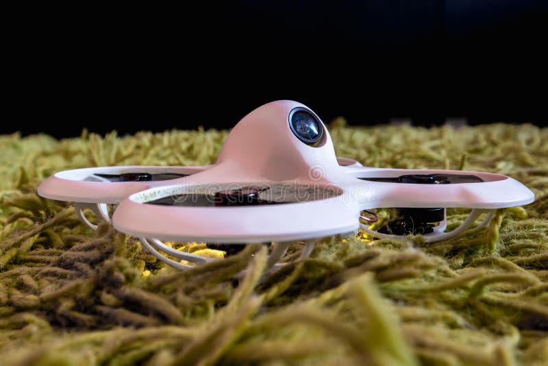 Small white indoor home brushless fpv quadcopter. Indoor home brushless stock images, royalty-free photos and pictures