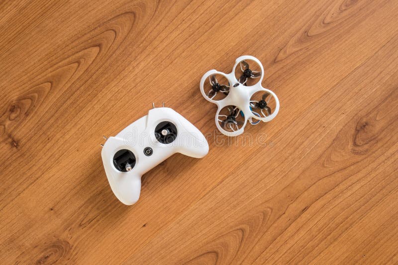 Small white indoor home brushless fpv quadcopter. Indoor home brushless stock images, royalty-free photos and pictures