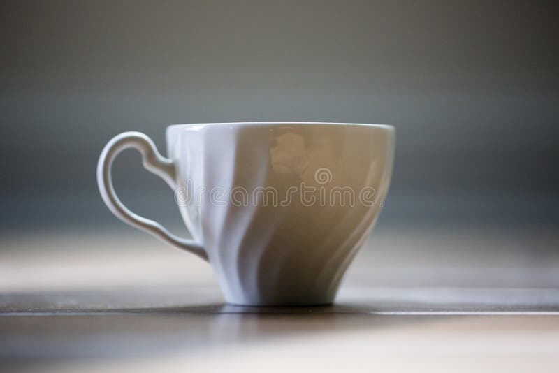 Small white tea cup stock photo. Image of england, dark 99020178