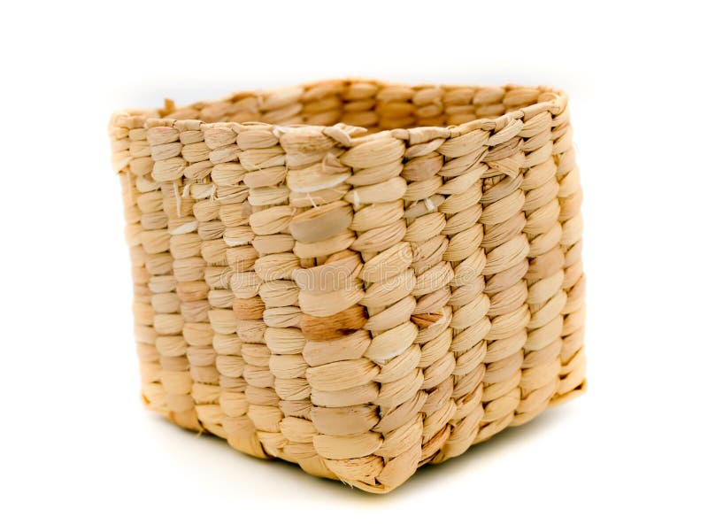 Small wicker basket handmade of fiber from plant and natural material isolated on white backgroud, closeup shot