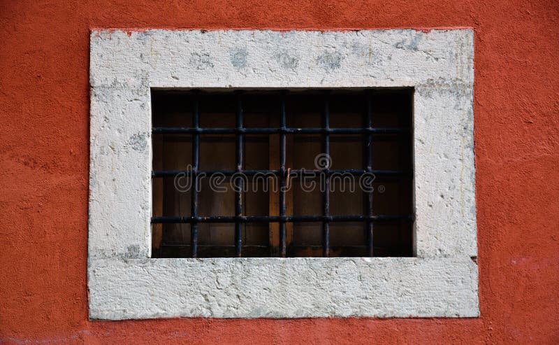 Small Window on red wall