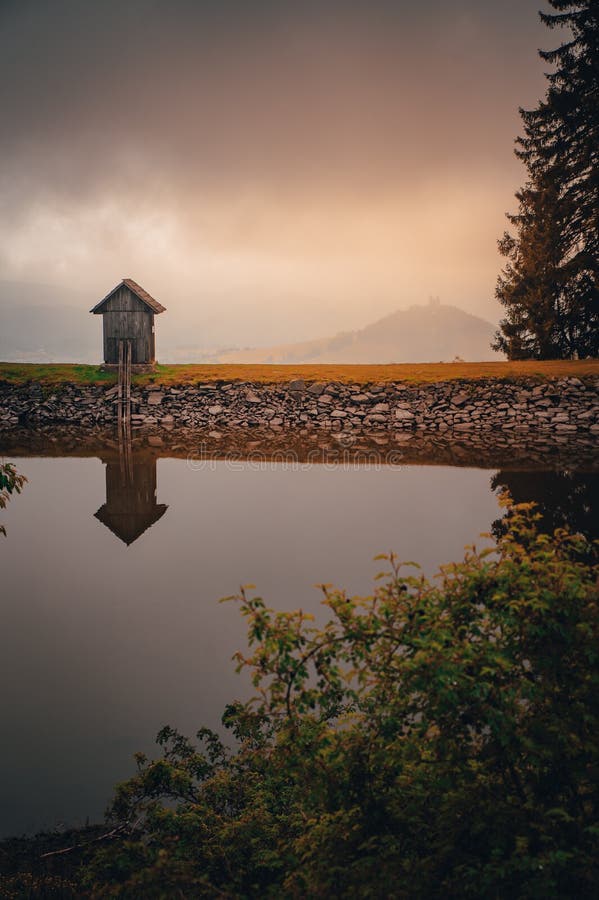 Small wooden house by the lake, romantic scene, tajch ottergrund, banska stiavnica, slovakia