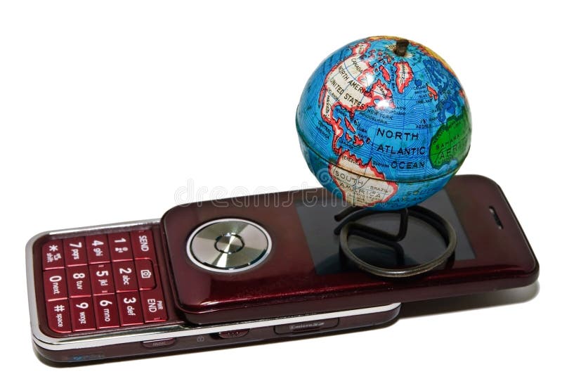 Small World Globe and Cell Phone royalty free stock images Small World Globe and Cell Phone royalty free stock images