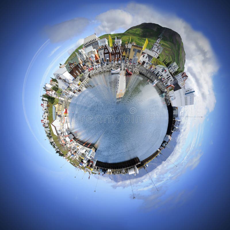 Living in your own world makes life simple and pleasant. A spherised manipulation of a panoramic stitch from 34 images of the arctic fishing village of Husavik, Iceland. Living in your own world makes life simple and pleasant. A spherised manipulation of a panoramic stitch from 34 images of the arctic fishing village of Husavik, Iceland