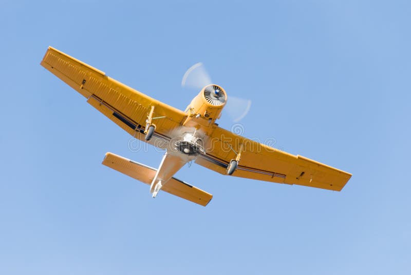 Small yellow duster airplane