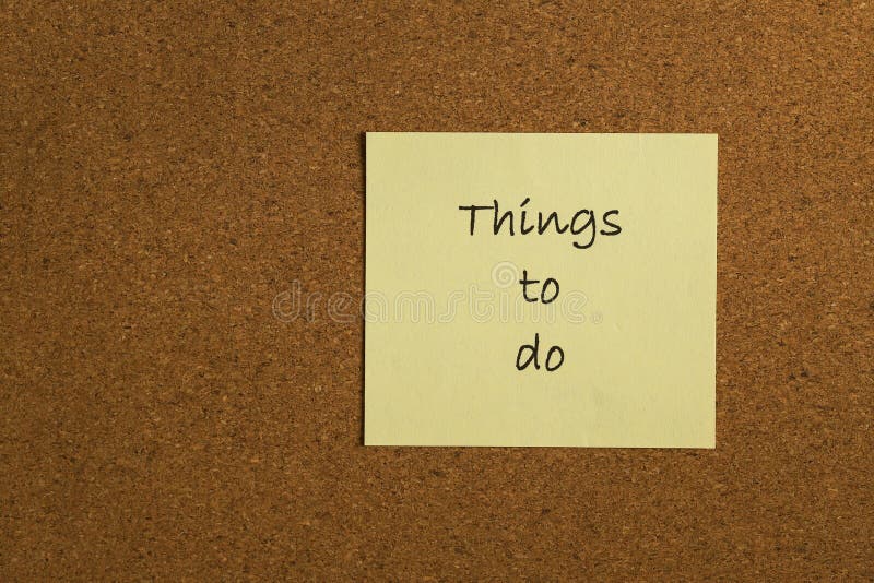 Small Yellow Sticky Note on Office Noticeboard Stock Image Image of