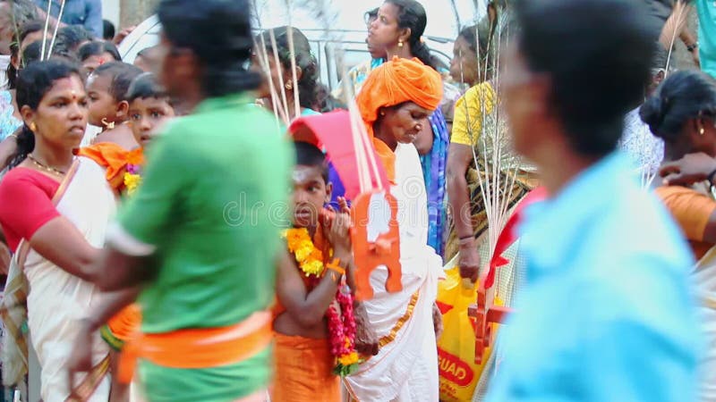 Smallest Fest Participants in Flower Garlands with Mothers