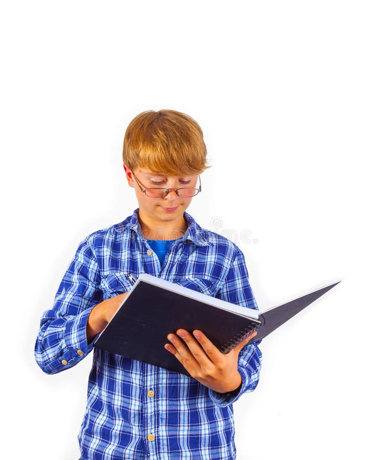 Smart Boy Wearing Glasses is Reading in a Book Stock Photo Image of schooler, male 28974404