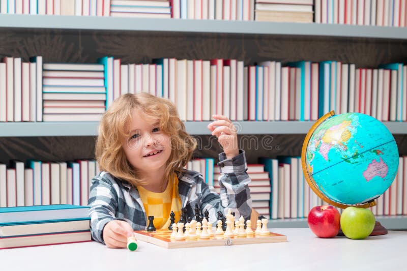 Pupil Kid Thinking About His Next Move In A Game Of Chess. Clever  Concentrated And Thinking Child While Playing Chess. Little Clever Boy  Thinking About Chess. Games Good For Brain Intelligence. Stock