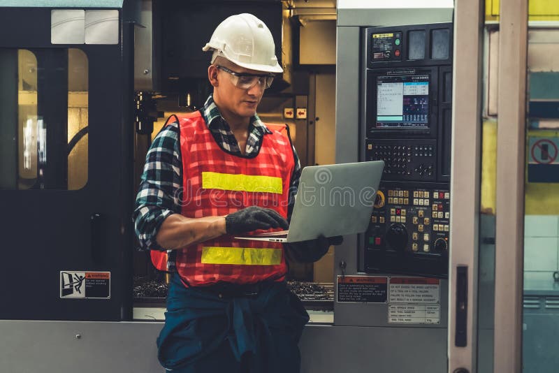 Smart Factory Worker or Engineer Do Machine Job in a Manufacturing