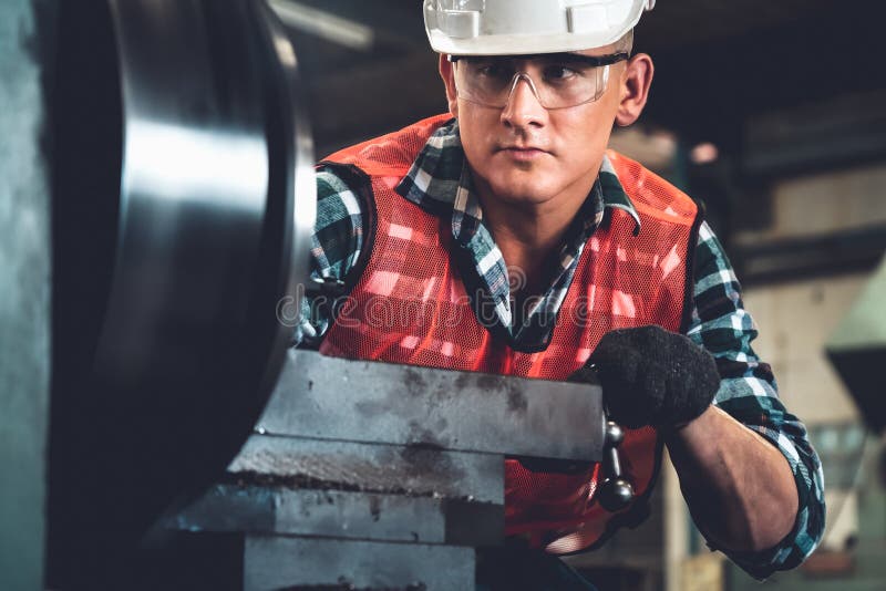 Smart Factory Worker or Engineer Do Machine Job in a Manufacturing