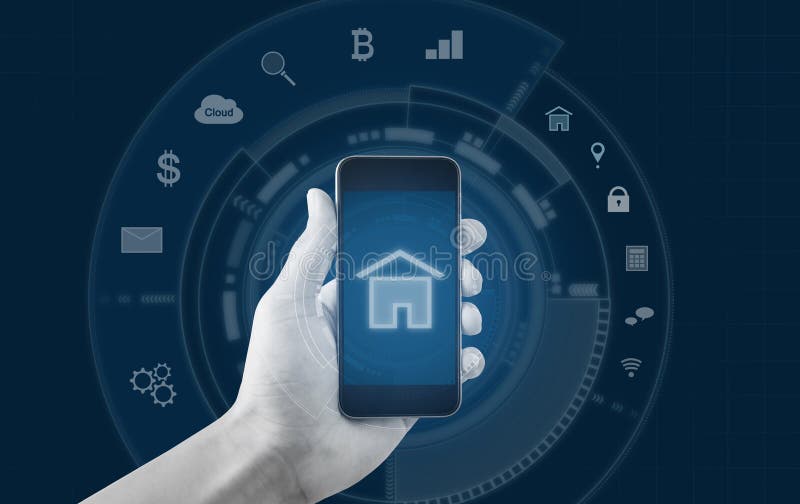 Smart home and buildings mobile application. Hand holding mobile smart phone royalty free stock photography