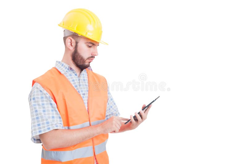 Smart and modern builder or engineer using tablet stock photos