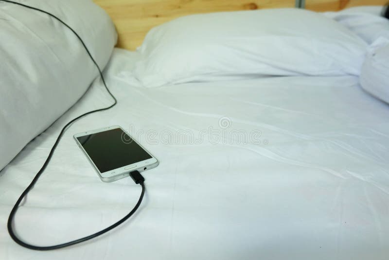 199 Mobile Phone Plugged Charging Adapter Stock Photos Free & Royalty