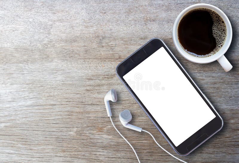 Smart phone and earphone with cup of coffee