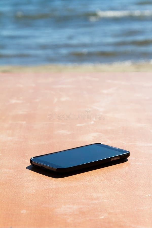 Smart Phone on Table stock photo. Image of cell, cellular 34042972
