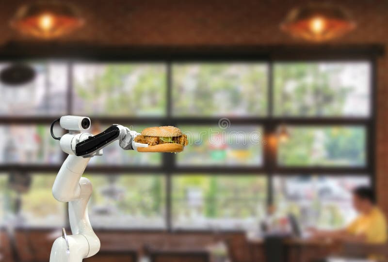 Smart robot-mathamburgare i en restaurang för framtida robotautomatisering ökar effektiviteten arkivfoton