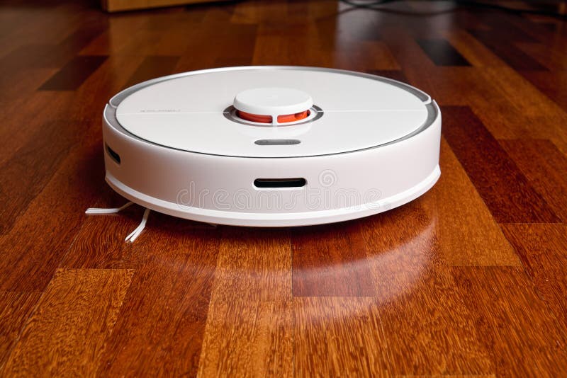 Smart Robot Vacuum Cleaner Xiaomi Roborock S5 Max on Wood Floor. Robot  Vacuum Cleaner Performs Automatic Cleaning of the Editorial Photo - Image  of floor, automatically: 208601566