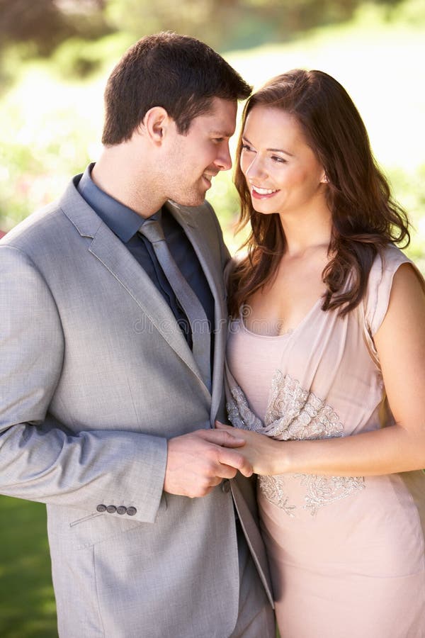 Smartly Dressed Young couple in park stock photo Smartly Dressed Young couple in park stock photo