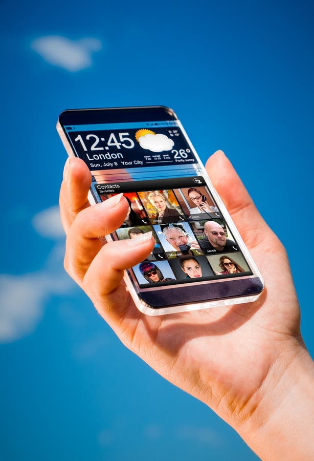 Smartphone avec l'écran transparent dans des mains humaines photo stock Smartphone avec l'écran transparent dans des mains humaines photo stock