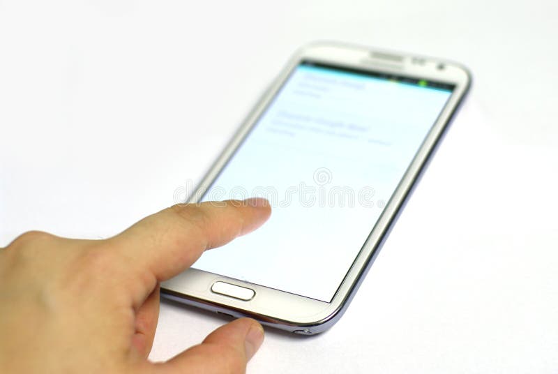 Smartphone con con il dito immagini stock libere da diritti