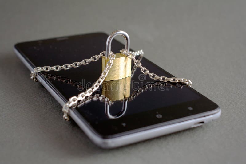 Smartphone with lock padlock chain on a gray background. Concept of mobile phone security. social network issues, forgot password