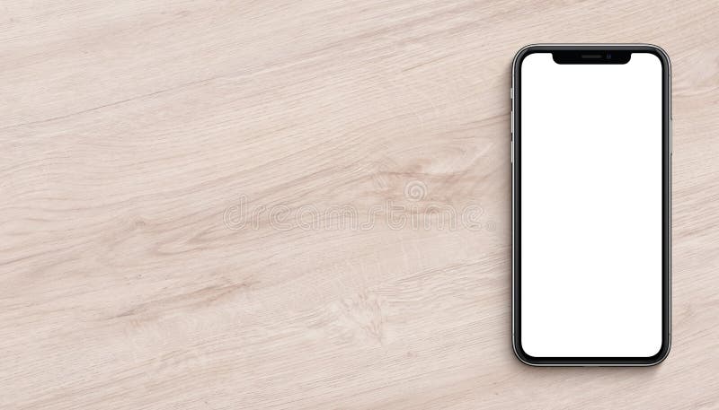 Smartphone similar to iPhone X mockup flat lay top view lying on wooden office desk banner with copy space