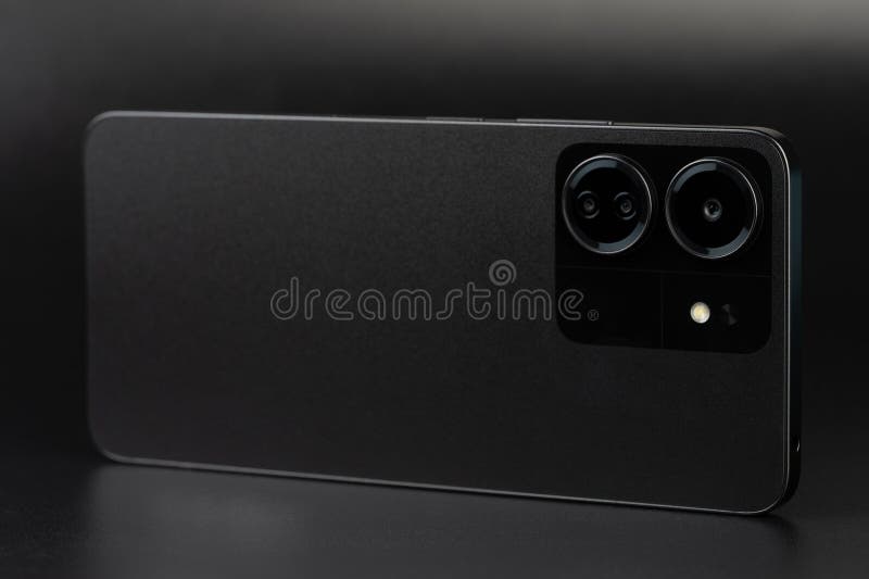 Black smartphone with camera set rear view in horizontal view. Black smartphone with camera set rear view in horizontal view