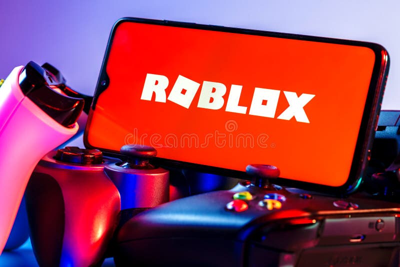 Cali, Colombia - August 15, 2021: Roblox logo on PC screen with keyboard,  mouse and speakers. Roblox is an online game platform and game creation  system. Stock Photo