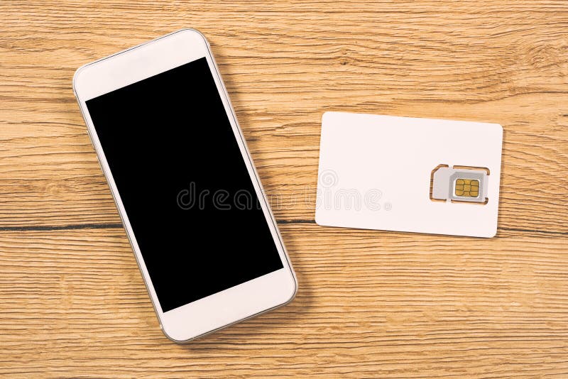 Smartphone and SIM Card on Office Table, Top View Stock Image Image