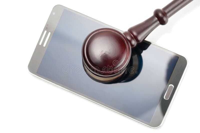 Judge gavel over neat smartphone - studio shot on white. Judge gavel over neat smartphone - studio shot on white