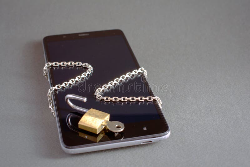 Smartphone with unlock padlock chain royalty free stock image