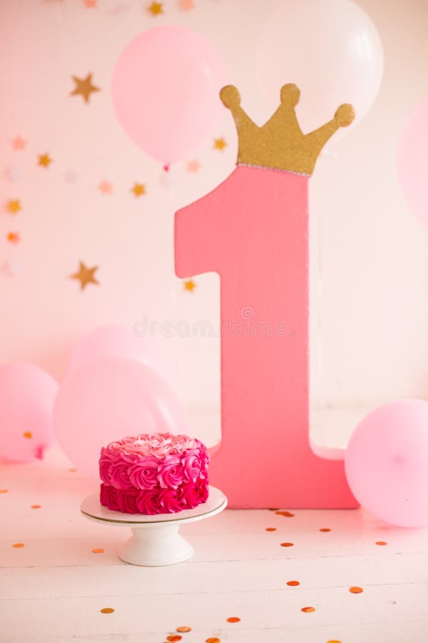 Smash cake first year pink stock photo