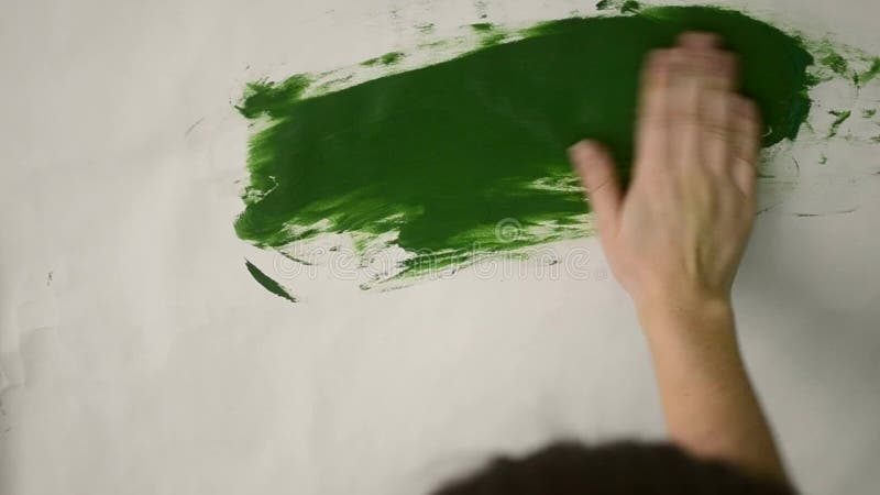 Smear green paint on a white background