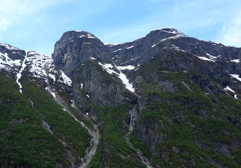 Smeltende sneeuw in Norways-fiords royalty-vrije stock afbeelding Smeltende sneeuw in Norways-fiords royalty-vrije stock afbeelding
