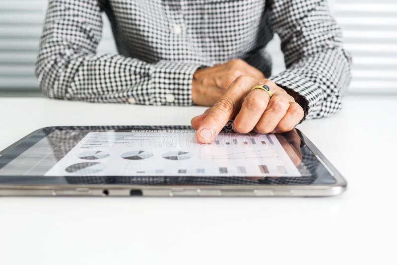 SMEs Business Owner is Using a Tablet Stock Image Image of desk
