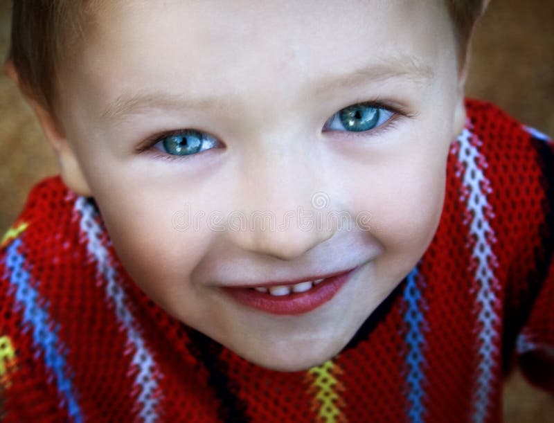 Smile of cute adorable kid with beautiful eyes