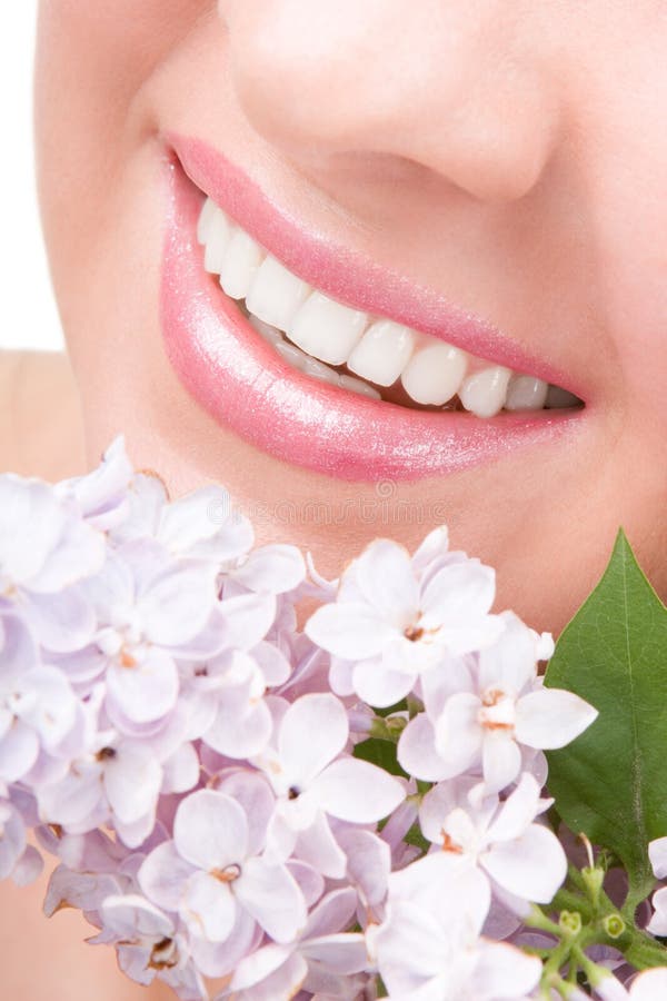 Smile of woman with flowers