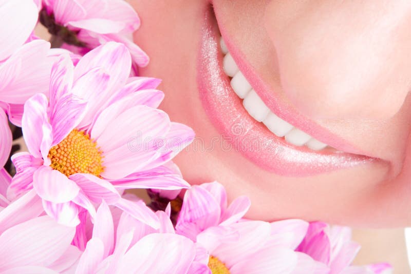 Smile of woman with flowers