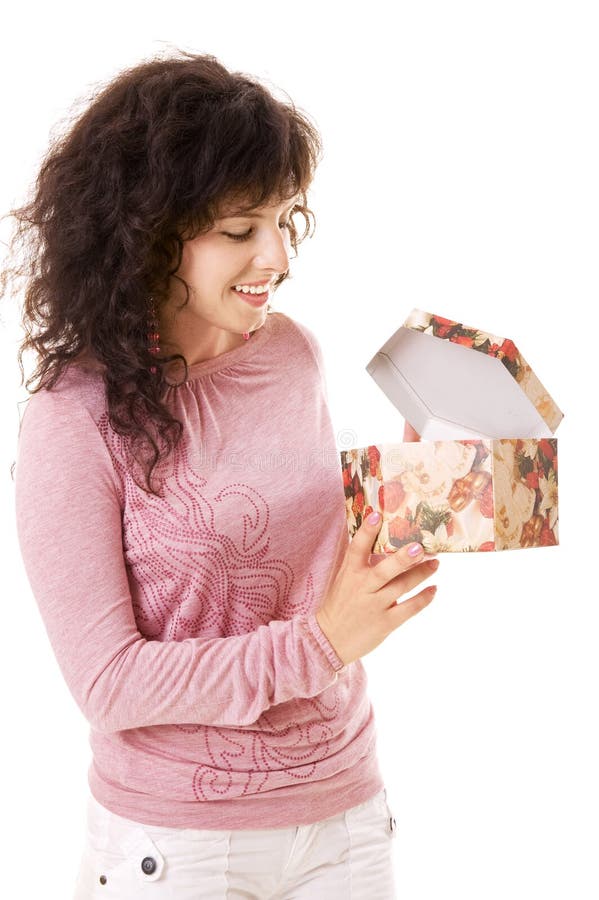 Smiley girl looking in the gift box