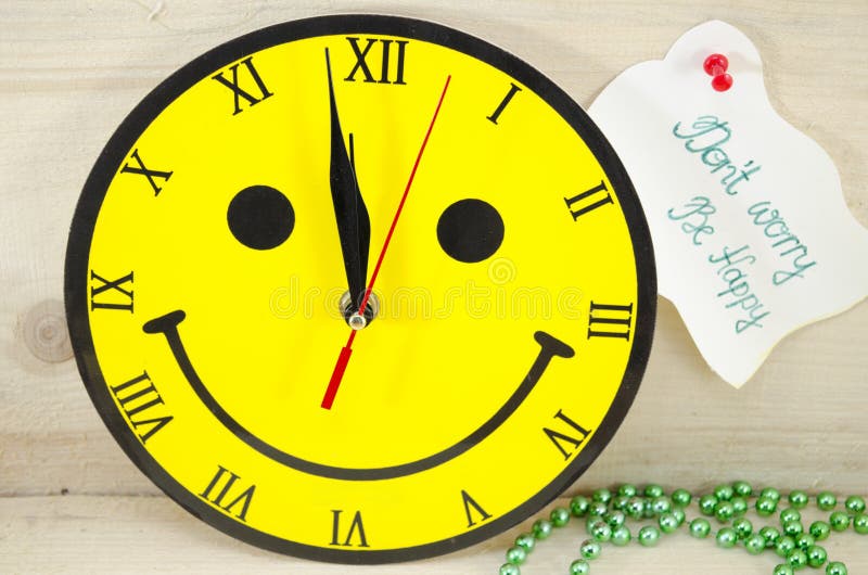 Smiley clock showing a minute to twelve. Smiley clock showing a minute to twelve