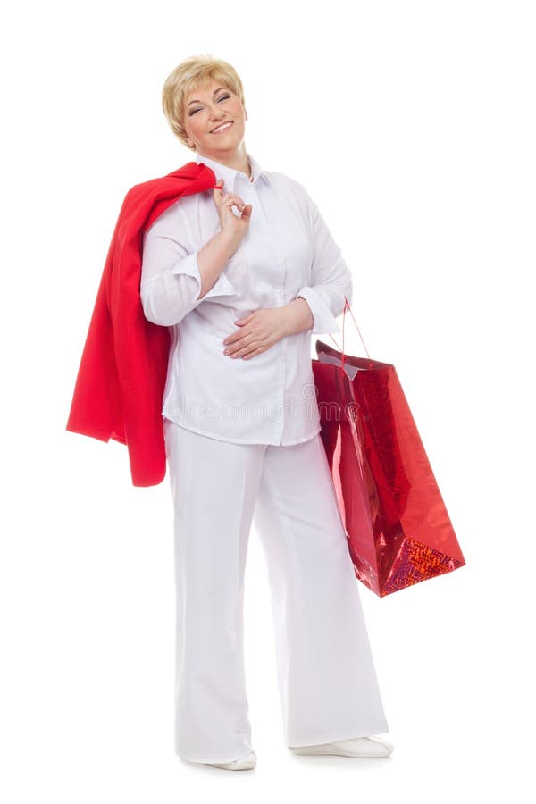 Smiling adult woman with shopping bags