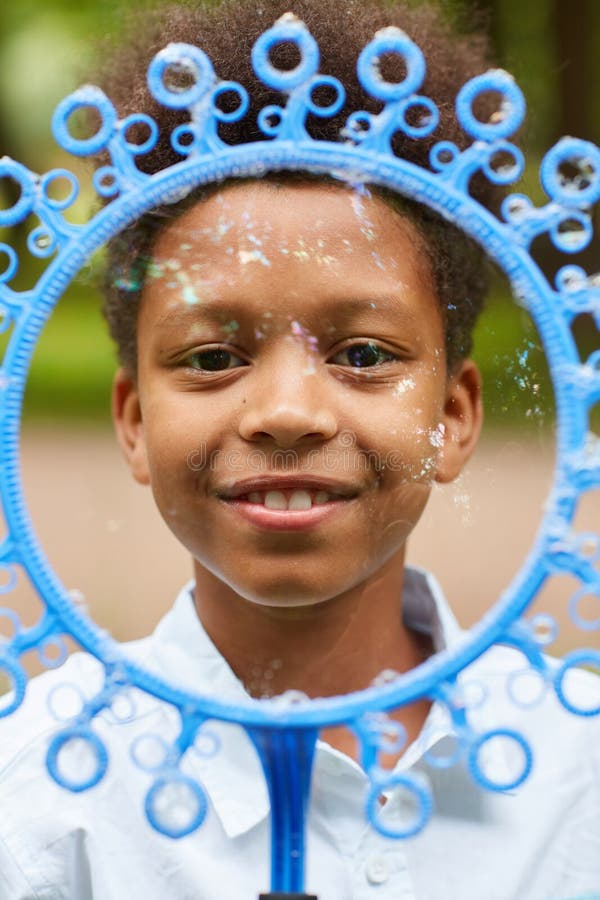 Smiling African Boy Playing Online Games in Class Stock Photo - Image of  phone, modern: 177228872