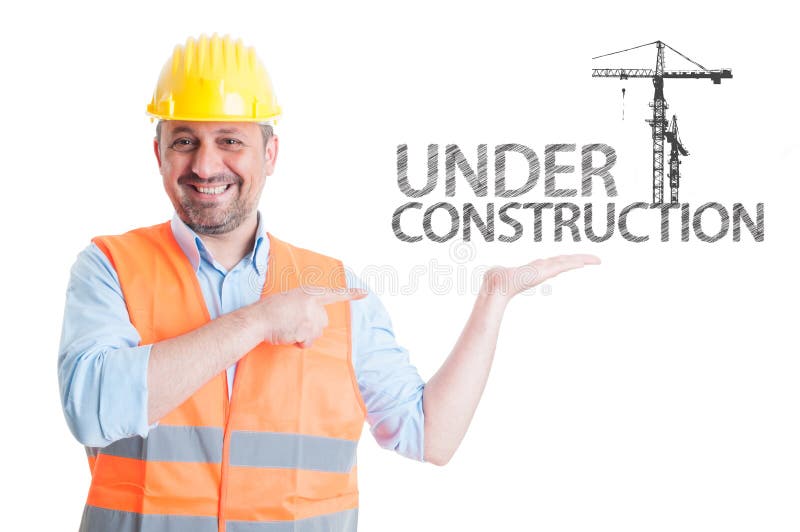 Smiling architect pointing at building crane royalty free stock images
