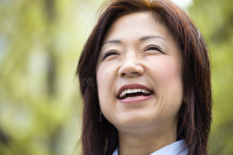 Smiling Asian woman royalty free stock image