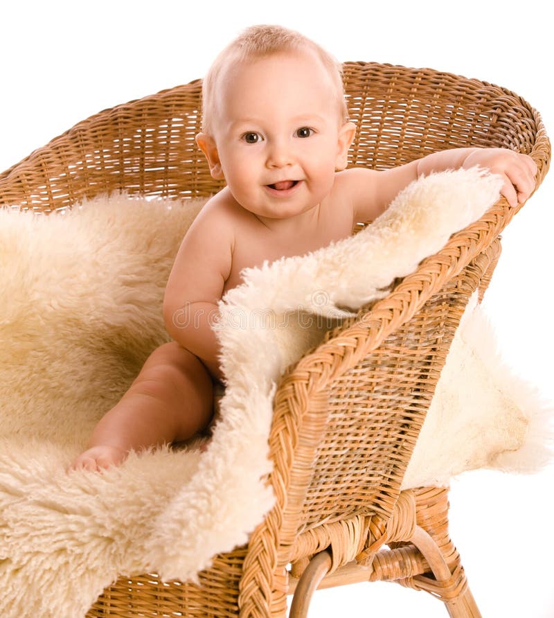 Smiling baby in armchair