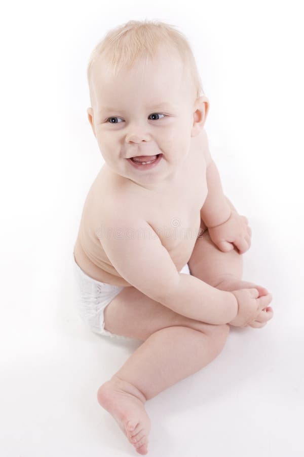 Smiling Babyboy in a Diaper Sitting on the Floor Stock Photo Image