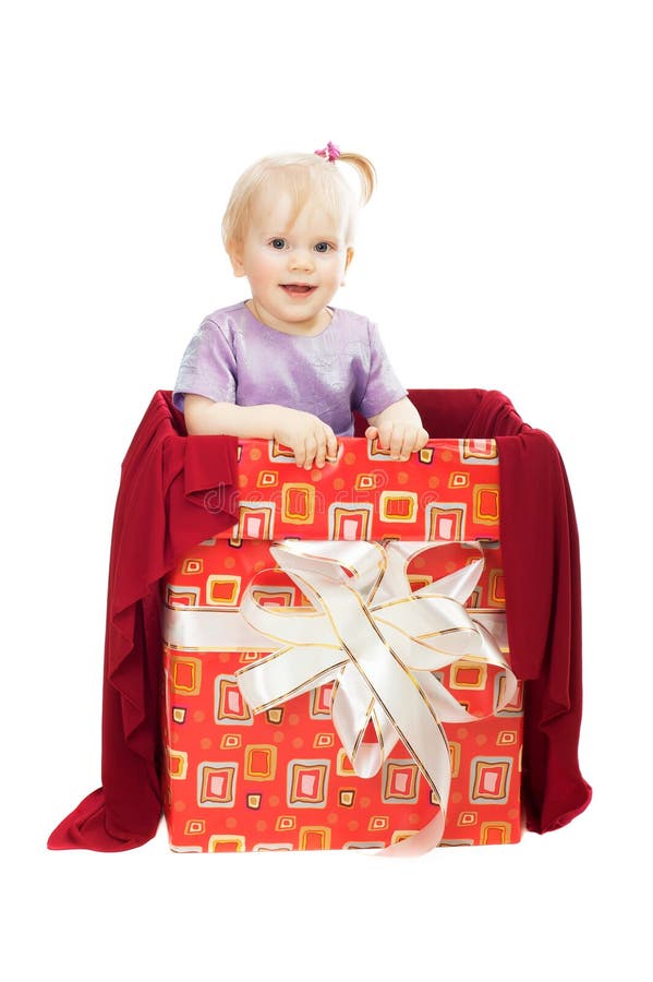 Smiling baby girl in gift box