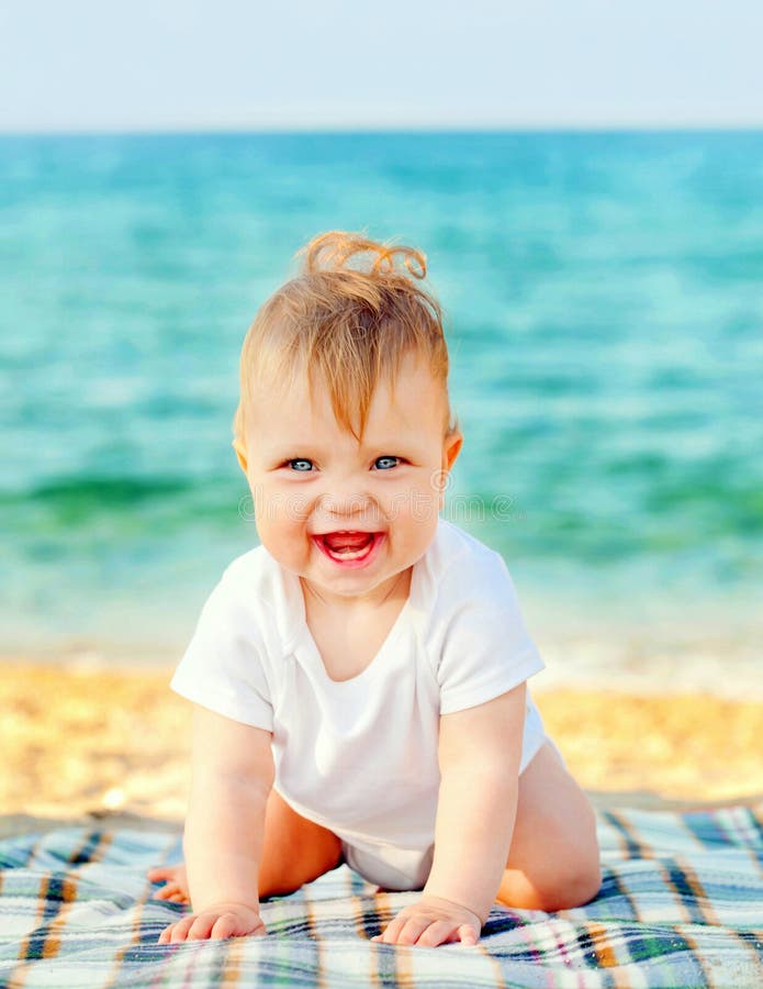 Smiling Baby Resting on Tropical Beach. Stock Image Image of infant