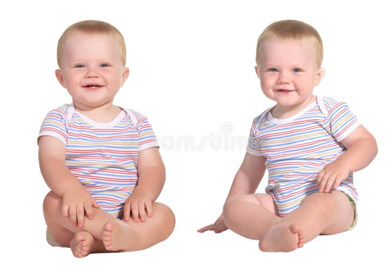 Smiling baby twins sitting